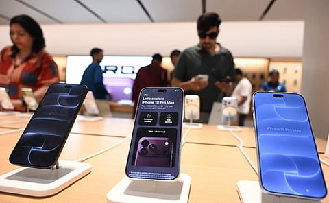 Customers check products inside the Apple Store at Select Citywalk Mall, New Delhi, during the official sales launch of the iPhone 18 Pro and iPhone 18 Pro Max