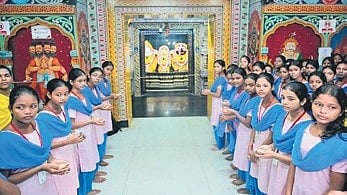 Students offering prayers at Jagannath temple on KISS campus for PM’s b’day.