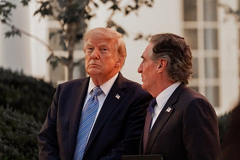 President Donald Trump stands with Interior Secretary Doug Burgum during a dinner in the Rose Garden of the White House, Thursday, Sept. 17, 2026, in Washington.