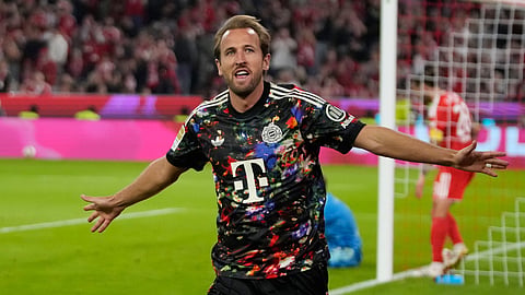 Bayern's Harry Kane celebrates after scoring his side's fourth goal during the Bundesliga soccer match between Bayern Munich and 1. FC Union Berlin in Munich, Germany, Friday, Sept. 18, 2026.