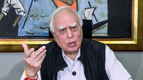 Rajya Sabha MP and senior advocate Kapil Sibal speaks to the media, in New Delhi.