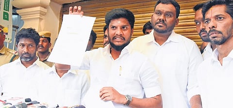 HR&CE Minister S Ramesh showing alleged proof of Sri Ranganathaswamy Temple land being transferred with fake documents in Srirangam, Tiruchy