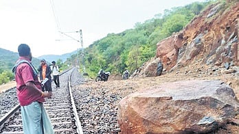 The Nagercoil - Bengaluru SMVT train was delayed after a landslide caused a boulder from the hills near Muthamapatti to hit the moving train.