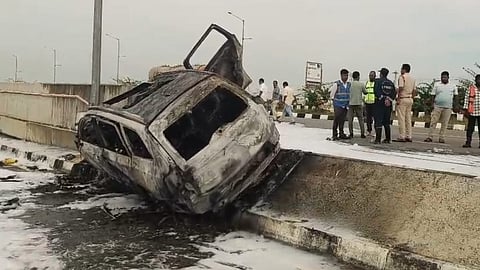 The vehicle caught fire and was entirely engulfed in flames.