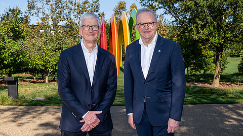 Australia's Prime Minister Anthony Albanese (R) posing for pictures with former Apple CEO Tim Cook on September 19, 2026, in Cupertino, California.