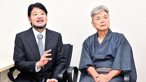 Takeo Shikama (R) and his associate Haruhiko Otsuka.