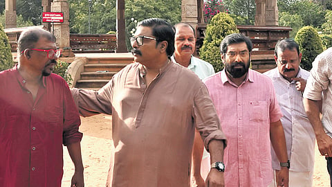 Poet Murukan Kattakkada, actor Sudheer Karamana and Corporation councillor SP Deepak leave after attending a protest at the Museum on Monday