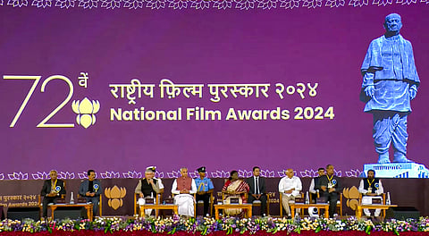 In this screengrab from a video received on Sept. 22, 2026, President Droupadi Murmu with Gujarat Governor Acharya Devvrat, Chief Minister Bhupendra Patel, Union Minister Ashwini Vaishnaw and others during the 72nd National Film Awards, at Kevadia, in Narmada district, Gujarat.