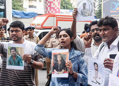: Demonstrators stage a candlelight protest to pay tribute to the suicide victims of IIT Bombay, in Mumbai, Monday, Sept. 21, 2026.