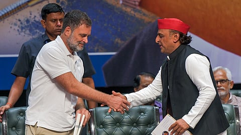 In this file photo from Aug. 04, 2026, Lok Sabha LoP Rahul Gandhi shakes hands with Samajwadi Party National President Akhilesh Yadav at an event in the Constitution Club of India in New Delhi.