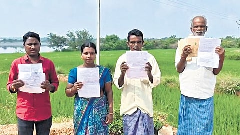 Erravalli farmers show the notices asking them to produce their land documents.
