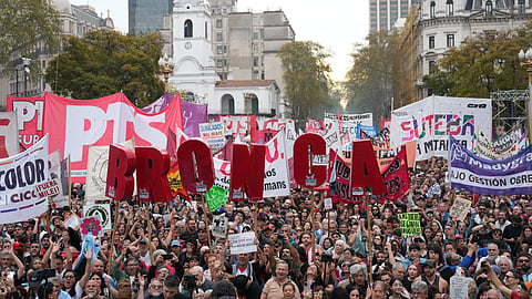 Anti-government protesters demonstrate in Plaza de Mayo, holding letters spelling the Spanish word "Anger," in Buenos Aires, Argentina, Saturday, Sept. 19, 2026.