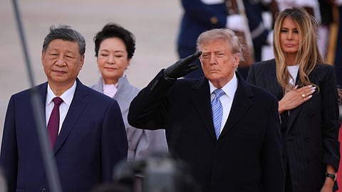 President Donald Trump and first lady Melania Trump greet Chinese President Xi Jinping and his wife Peng Liyuan as they arrive at Joint Base Andrews, Md., Wednesday, Sept. 23, 2026.