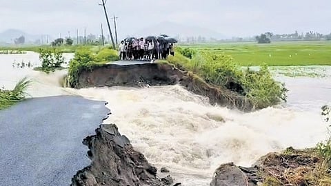 The road between Galavalli and Chinna Galavalli was washed away due to a breach in Tamara Cheruvu embankment in North Coastal Andhra on Thursday