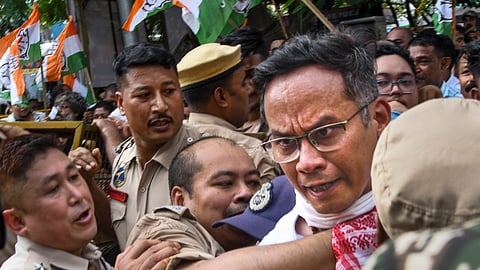 Police personnel detain MP and Assam Pradesh Congress Committee President Gaurav Gogoi during a protest carried out by Assam Pradesh Congress Committee against Chief Election Commissioner (CEC) Gyanesh Kumar, in Guwahati, Assam, Friday, Sept. 25, 2026.
