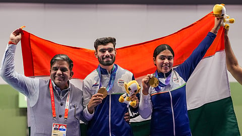 Indias Suruchi Singh, right, and Kamaljeet celebrate after winning Gold medal in the 10 meter air pistol mixed team final in the ongoing Asian Games 2026, in Nagoya, Japan, Friday, Sept. 25, 2026.