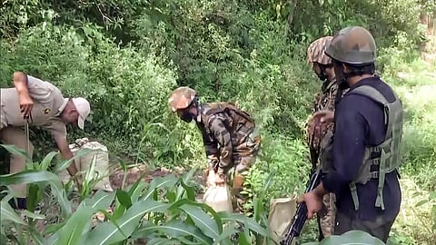 In this file photo from July 09, 2026, the Indian Army Bomb Disposal squad defuses an unexploded mortar shell found in an agricultural field near LOC in Poonch.