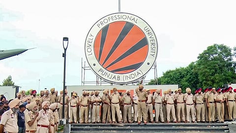 Police personnel stand guard at Lovely Professional University (LPU) following widespread student protests and campus unrest over alleged sexual assault claims in Phagwara, Monday, Sept. 28, 2026.