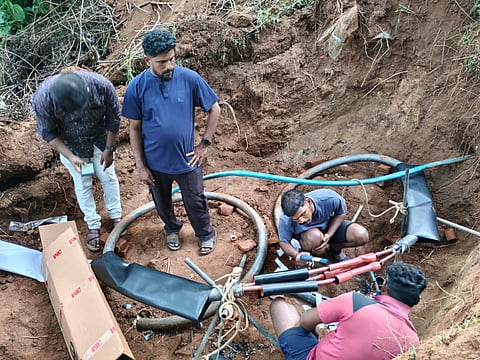 KSEB officials repairing underground cables in Murugala, Attappadi, on Sunday