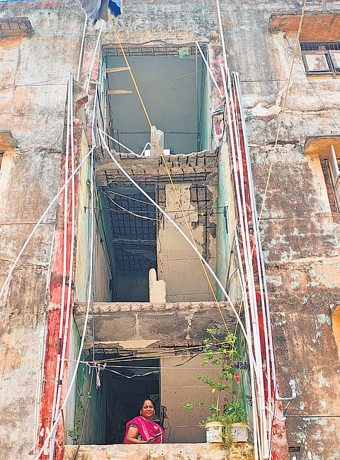 The dilapidated TNUHDB buildings at Srinivasapuram. The residents have raised concerns over the condition of the structure and say they need to be reconstructed.