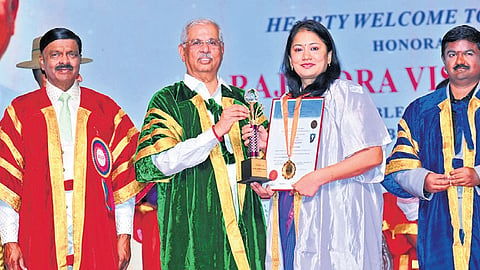 Governor Rajendra Arlekar conferring a degree on a graduand during the convocation at Dr MGR Educational and Research Institute University on Wednesday.