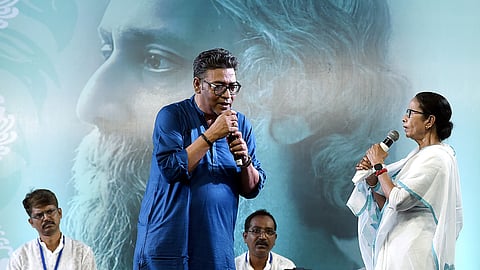 Former West Bengal chief minister Mamata Banerjee (right) along with former state MLA Indranil Sen (left).