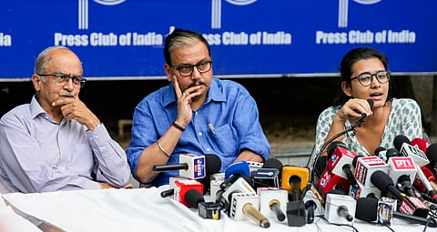 Rashtriya Janata Dal (RJD) MP Manoj Jha, centre, advocate Prashant Bhushan, left, and All India Students' Association (AISA) National President Neha Bora address a press conference calling for a protest at Jantar Mantar on October 2 to demand the resignation of Chief Election Commissioner Gyanesh Kumar, in New Delhi, Wednesday, Sept. 30, 2026.