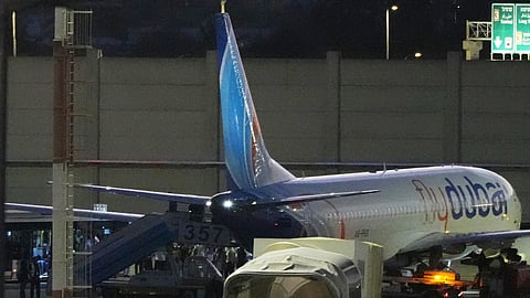 People disembark from a FlyDubai carrying Israeli passengers who had earlier been aboard another FlyDubai aircraft that made an emergency landing in Saudi Arabia approaches Ben Gurion International Airport near Tel Aviv, Israel, Wednesday, Sept. 30, 2026.