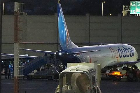 People disembark from a FlyDubai carrying Israeli passengers who had earlier been aboard another FlyDubai aircraft that made an emergency landing in Saudi Arabia approaches Ben Gurion International Airport near Tel Aviv, Israel, Wednesday, Sept. 30, 2026.
