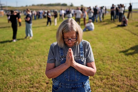 Kathleen Walter prays in the area reserved for people opposed to the death penalty outside Riverbend Maximum Security Institution before the planned execution of Christa Pike, Wednesday, Sept. 30, 2026, in Nashville, Tenn.
