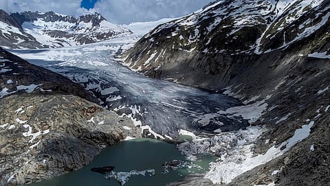 A lake of meltwater has formed on the tongue of the Rhone glacier near Goms, Switzerland, June 13, 2023.