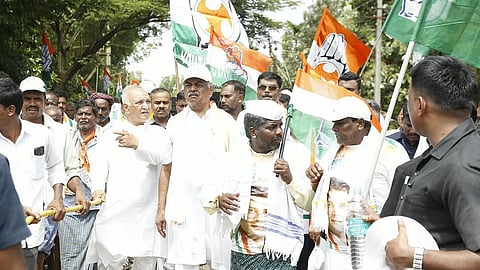 KPCC president B K Hariprasad takes part in the Janata Jodo Jagruti Yatra in Shikaripura, Shivamogga district, on Wednesday.