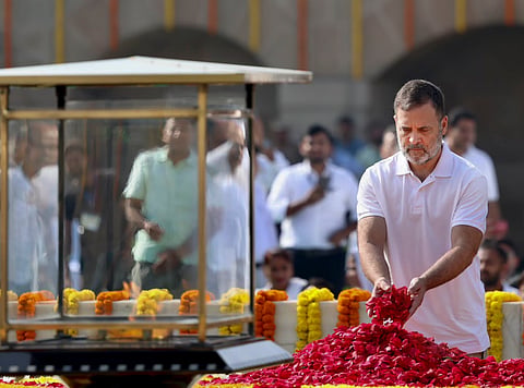 eader of Opposition (LoP) in the Lok Sabha Rahul Gandhi pays tribute to Mahatma Gandhi on his 157th birth anniversary, at Raj Ghat, in New Delhi.