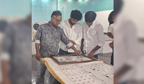 Selvaraj Joseph during an exhibition of his stamp collection