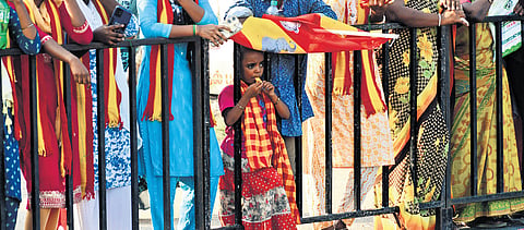 A child blowing a whistle during the TVK’s campaign in Madurantakam constituency on Friday