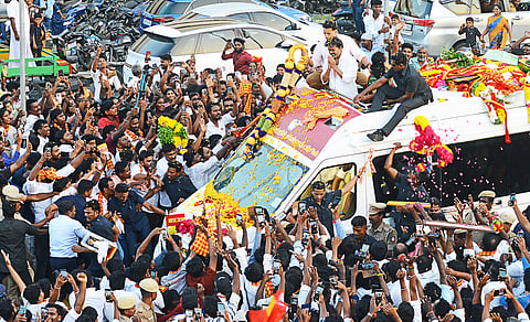 Chief Minister C Joseph Vijay greeting voters in Madurantakam
on Friday