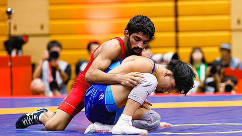 India freestyle wrestler Aman Sehrawat (L) in action on Saturday
