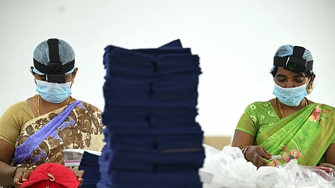 Workers in a factory in Karur, Tamil Nadu with GoPro cameras mounted on their head