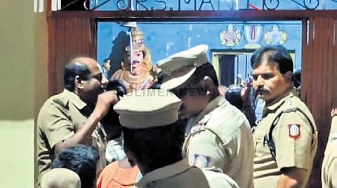 Screengrab of a video where police help residents to enter the temple.