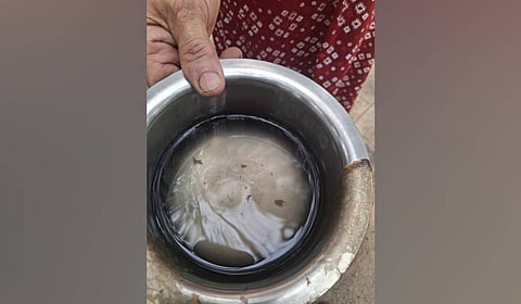 A resident of St Michael School Road in Shantinagar shows the water supplied from BWSSB pipelines.