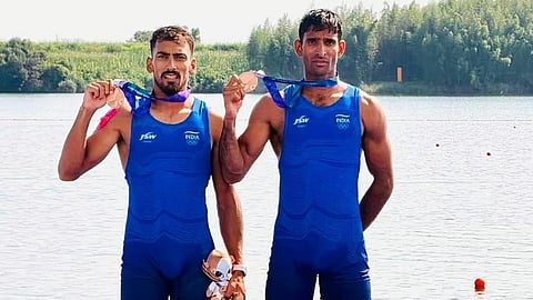 Satnam Singh (L) and Salman Khan celebrate their podium finish in Nagoya, Japan