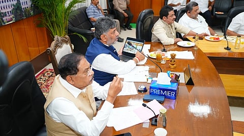 Chief Minister DK Shivakumar and Deputy Chief Minister Dr G Parameshwara hold a meeting with ministers, Congress MPs, MLAs and defeated candidates via video conference at CM’s Home Office ‘Krishna’ in Bengaluru on Tuesday.