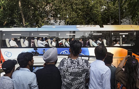 INDIA bloc MPs board a bus and move toward Jantar Mantar to hold a sit-in protest against Chief Election Commissioner Gyanesh Kumar, in New Delhi, Wednesday, Oct. 7, 2026