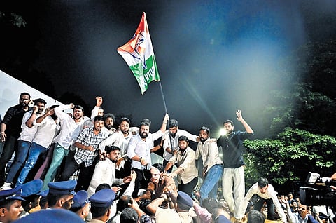 Youth Congress activists protest at Freedom Park in Bengaluru on Wednesday, condemning the arrest of their party leaders Rahul Gandhi and Priyanka Gandhi Vadra.