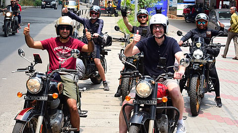 The five foreign tourists, who are on an all-India motorcycle trip that began in Kochi, riding through M G Road on Tuesday.