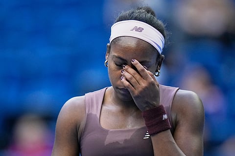 Coco Gauff of the United States reacts during play against Elise Mertens of Belgium during the fourth round of the women's singles match at the China Open tennis tournament in Beijing, Wednesday, Oct. 7, 2026.
