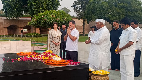 Congress President Mallikarjun Kharge and party leaders Rahul Gandhi, Priyanka Gandhi Vadra and KC Venugopal pay tribute to Mahatma Gandhi during a visit by INDIA bloc leaders at Raj Ghat, in New Delhi, Thursday, Oct. 8, 2026