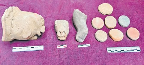Terracotta figurines and circular discs found during a surface survey along the Thenpennai river near Panruti on Thursday