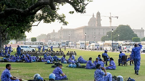 Security personnel at Kartavya Path ahead of a proposed protest call by the Cockroach Janta Party (CJP), in New Delhi, Friday, Oct. 9, 2026. Delhi Police have heightened security across Lutyens' Delhi, deploying extra force and enforcing Section 163 of the BNSS prohibiting unlawful gatherings.