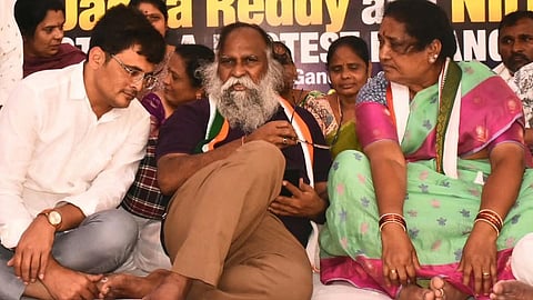 TPCC working president T Jayaprakash Reddy, his wife Nirmala and other Congress leaders sit on a hunger strike in Sangareddy on Thursday.